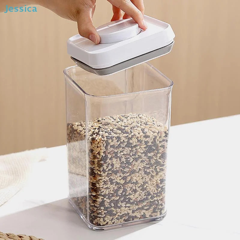 Airtight food storage container with white push-lock lid, clear body filled with grains
