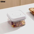 450ml airtight food container with white push-lock lid, clear body filled with snacks