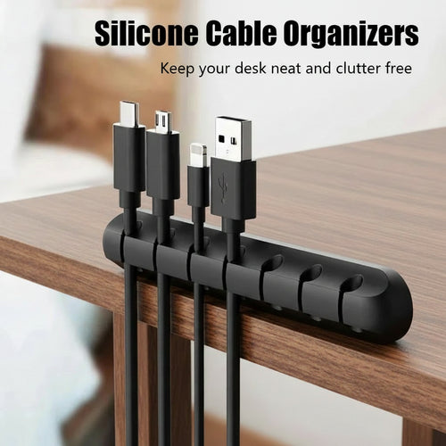 Black silicone desk cable organizer clip bar with multiple cable slots for USB chargers